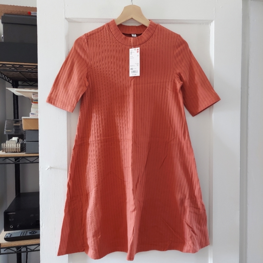 Uniqlo mock neck flare babydoll dress. Brand new with tags. Size Xs